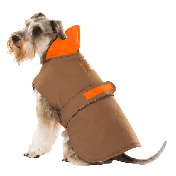 Hamish McBeth earth brown all-weather dog coat is windproof and water-resistant with orange highlights is an outdoor gear essential. The unique design of our dog coat allows it to wrap around the chest area to cover and provide extra protection. Easy to fit with velcro straps on top. and is fully quilted for extra warmth. Available in 6 sizes for small  to large dogs.