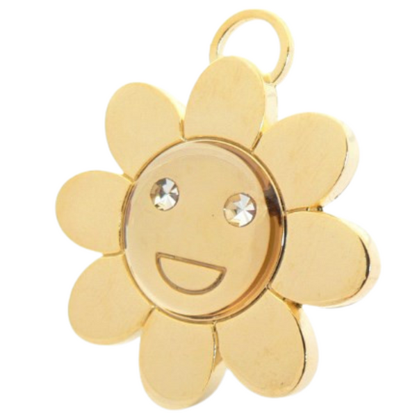 Hamish McBeth flower pet ID tag with Czech crystals for eyes. Unique design, rustproof, thick, heavy duty metal, with a protective coating. Free laser engraving with a polished mirror finish and split ring included. Available in gold or silver. Size: 3 x 3cm