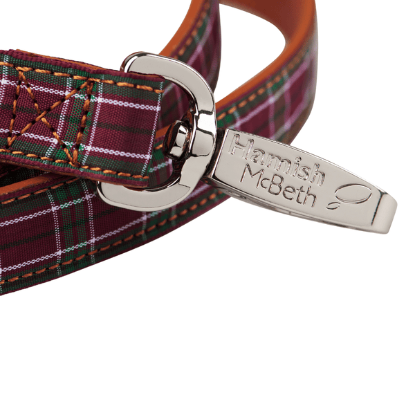 Hamish McBeth stylish purple tartan dog lead for the Scottish pooch around town. Fine quality leather lead with tartan overlay for a perfect match with our Highland Purple collars.