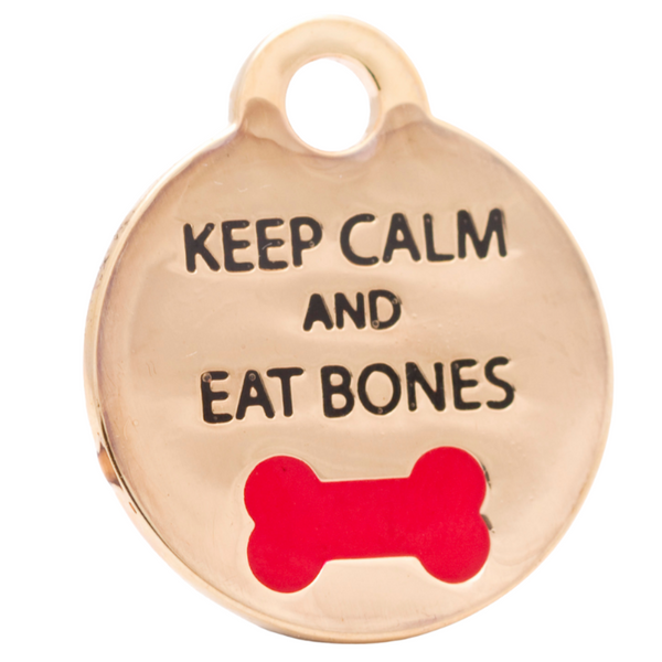 Hamish McBeth Keep Calm and Eat Bones pet ID tag with painted red bone. Rustproof, thick, heavy duty metal, with protective coating. Free laser engraving with a polished mirror finish and split ring included. Available in gold or silver. Size: 2.5 x 2.5cm