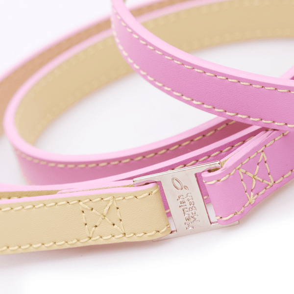 Hamish McBeth pink slim dog lead with beige handle and matching stitching.  Vegetable-dyed luxury top grain leather with super soft texture. Perfect match with Pink Bones collar.